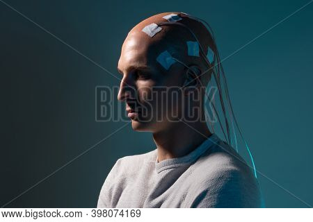 Neurointerface, Brain - Computer Communication. Cyber Punk Concept Of A Futuristic Person Connected 