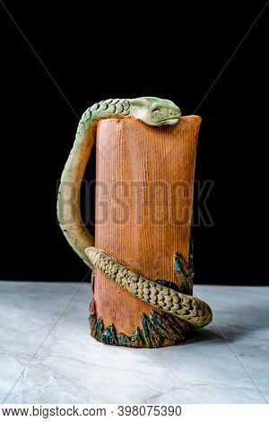 Handmade Ceramic Carafe Snake Pattern Design.