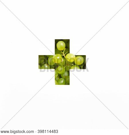 Plus Summation Sign Or Cross Of Green Fresh Grape And Cut Paper Isolated On White. Festive Typeface 