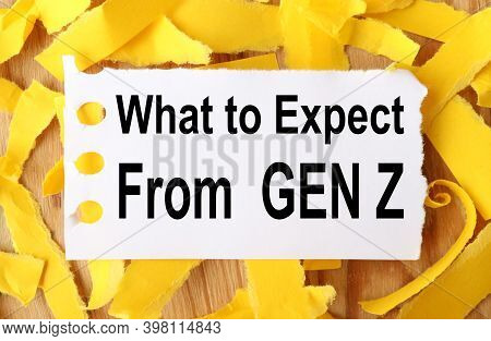 What To Expect From Gen Z. Text On White Paper On Torn Paper Background