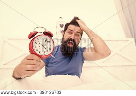 Stress Concept. Man Awake Unhappy With Alarm Clock Ringing. Insomnia Drives Me Crazy. Wakes Up In Mo