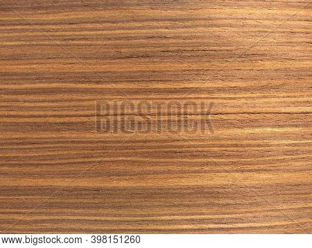 Natural Light Coral Louro Preto Wood Texture Background. Veneer Surface For Interior And Exterior Ma
