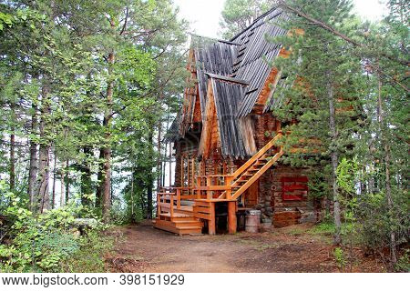 An Old Russian Wooden House Of Round Logs, Called Terem