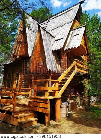 An Old Russian Wooden House Of Round Logs, Called Terem