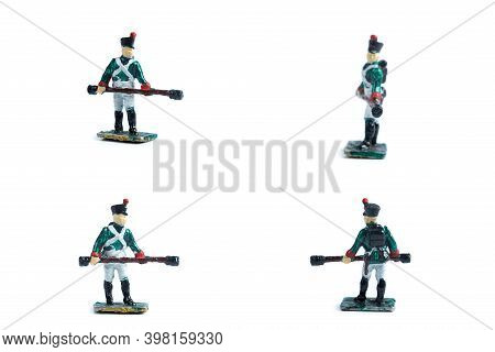 4 In 1 Image Of Handmade Metal Soldiers With Musket On The White Background