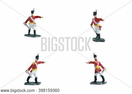 4 In 1 Shot Of Handmade Tin Soldiers With Sword On The White Background