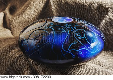 Colors Steel Tongue Drum, Vadjraghanta, Tank Drum Close-up Modern Musical Instrument