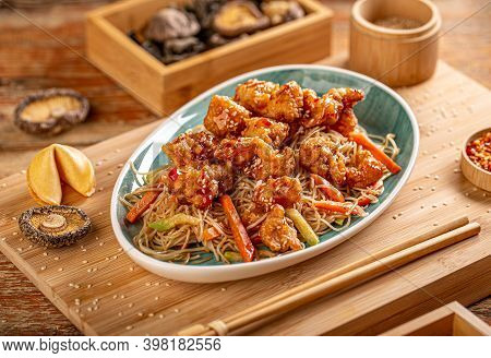 Chicken With Teriyaki Sauce Served With Moodles. Chinese Food.