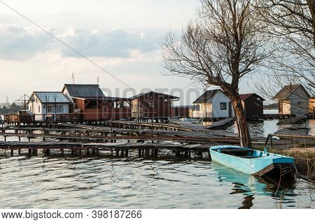 A Picture From Hungary, From A Place Called Bokod. The Local People Have The Wooden Cottages On Pylo