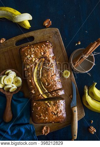 Freshly Baked Banana Bread, Sliced On A Cutting Board, With Banana, Cinnamon And Nuts. Bake Shop, Ho