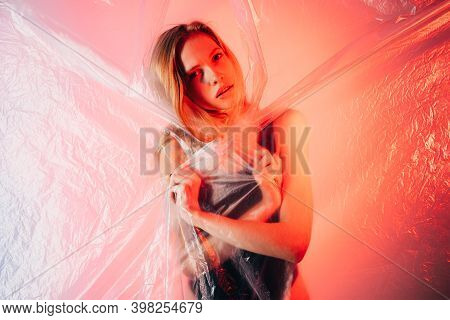 Neon Light Portrait. Female Abuse. Gender Equality. Self Isolation. Worried Insecure Woman In Black 