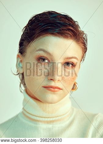 Portrait Of Cute Redhead Girl With Short Stylish Haircut And Freckles Contemptuously And Seriously L