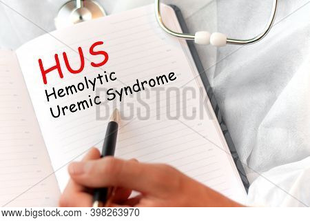 Doctor Holding A Card With Text Hus - Short For Hemolytic Uremic Syndrome, Medical Concept