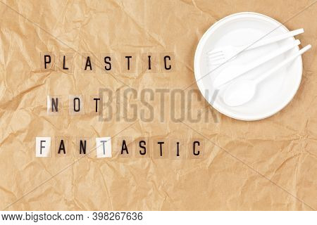 Disposable Appliances Plate, Fork, Spoon, Knife, Phrase From Letters On Transparent Base Plastic Not