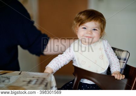 Father Feeding Baby Girl From Spoon Mashed Vegetables And Puree. Food, Child, Feeding And People Con