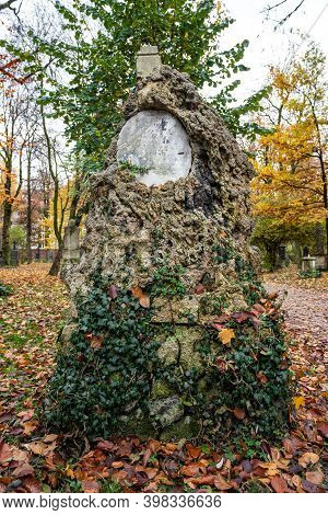 View Of Famous Old North Cemetery Of Munich, Germany With Historic Gravestones. Funerals Have Not Be