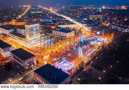 Gomel, Belarus. Main Christmas Tree And Festive Illumination On Lenin Square In Homel. New Year Cele
