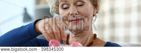 Portrait Of Senior Attractive Woman Holding Pink Piggy-bank. Elderly Female And Ceramic Container Fo