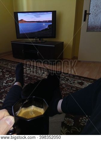 Chomutov, Czech Republic - October 06, 2020: Black Cat Violka, Coffe And Tv In Living Room