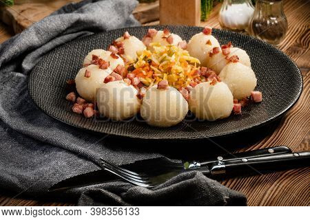 Meat Stuffed Potato Dumplings With Fried Onion And Greaves.