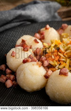 Meat Stuffed Potato Dumplings With Fried Onion And Greaves.