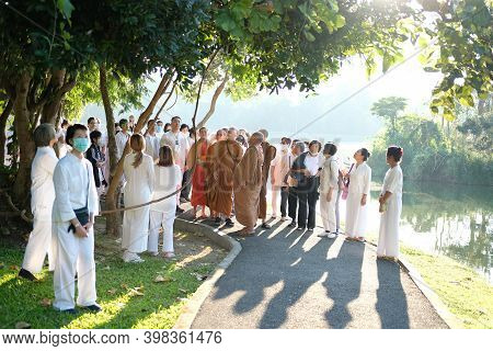 Buddhist Monk Teaching Dhamma To People