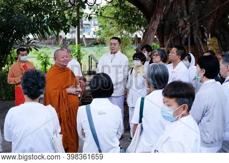 Buddhist Monk Teaching Dhamma To People