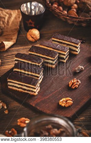 Gerbeaud Cake, A Crispy Pastry With Walnut, Apricot Jam And A Shining Chocolate Glaze.