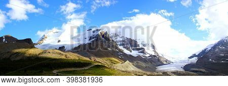 Panoramic View: Columbia Icefield / Athabsca Glacier In The Canadian Rocky Mountains In Banff And Ja