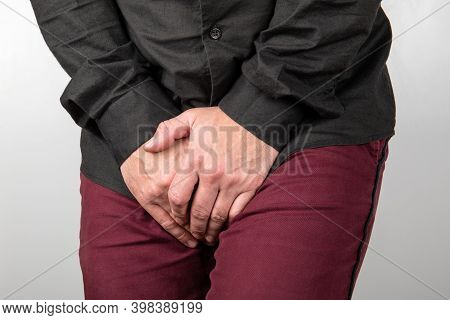 Urinary And Prostate Problems In Men. Male Holding Intimate Parts