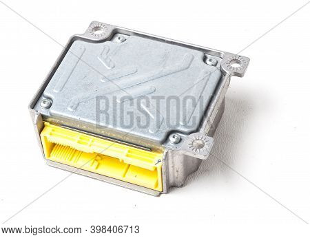 A Spare Part For A Car - Engine Control Unit In Black On A White Isolated Background Is A Connecting