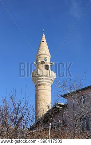 Small Minaret With Blue Sky Background In Nigde,turkey