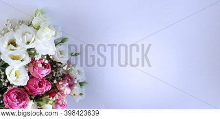 Festive Flower Arrangement - White And Pink Eustoms On A White Background. Background For A Holiday 
