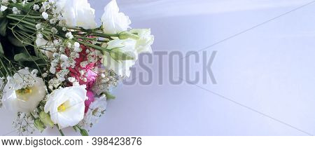 Festive Flower Arrangement - White And Pink Eustoms On A White Background. Background For A Holiday 