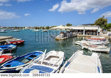 Paros, Greece - September 27, 2020: Fishing Boats In Aliki Harbor. Aliki Is Beautiful Coastal Villag