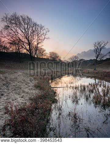 Sunset In The Dunes Of Kijkduin, The Netherlands.