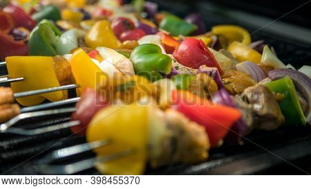 Chef Cooking Barbecue With Skewers On Grilled Meat. Very Delicious Brochette Bbq