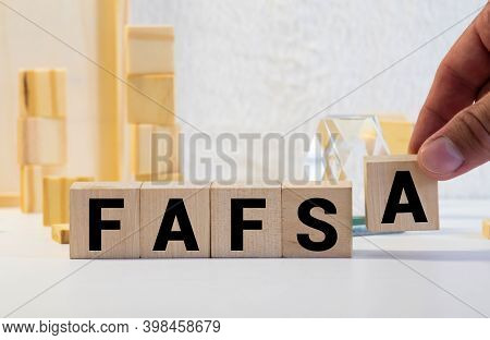 Wooden Cubes With The Abbreviation Free Application For Federal Student Aid Fafsa.