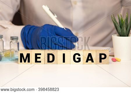Word Medigap Made With Wood Building Blocks.