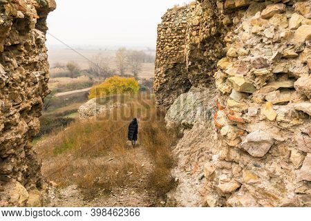 Close Up View Of Female Tourist Walk Around Historical Ruins Site In Southern Georgia - Gagi Fortres