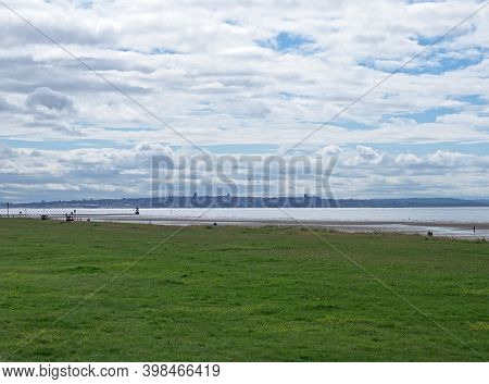 Grass Path Near The The Beach At Blundell Sands Near Southport With Liverpool City Visible In The Di