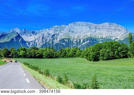 Panoramic View On Breche De Faraut Mountain Range In French Prealps In Summer