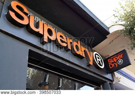 Bordeaux , Aquitaine  France - 12 01 2020 : Superdry Logo And Orange Sign Text For Store Of British 