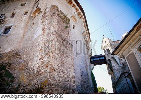 Gothic Imposing Historic Castle Pernstejn At Sunny Summer Day, Stronghold On Rock Above Village Of N