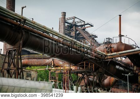 Old Rusty Mechanism Of Pipeline, Former Ironworks, Revamped Industrial Park, Closed Metallurgical Pl