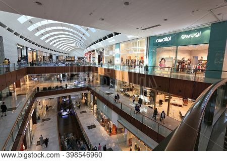 Dubai, Uae - November 22, 2017: Shoppers Visit Dubai Mall. It Is The Largest Mall In The World By To