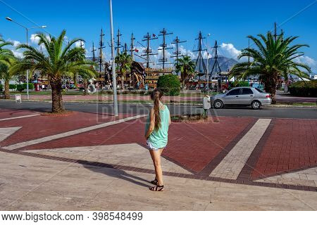 Alanya, Turkey - October 22, 2020: Tourist Woman Looks At Alanya Marina (yat Limani) Embankment With