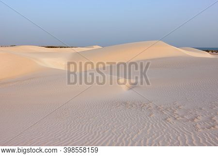 Big White Sand Dunes At Aomak Beach At Sunset, Socotra Island, Yemen. The Protected Area Of Aomak Be