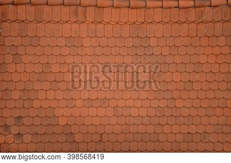 View Of The Roof Made Of Red Brick Burnt Tiles Of The Beaver Type Used In Central Europe On All Hist