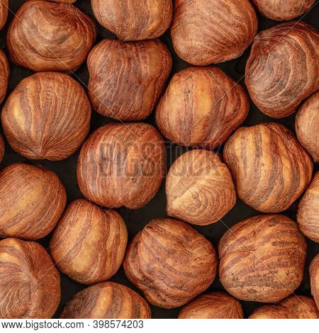 Hazelnuts Heap As A Background. Top View. Flat Lay. Hazel Nuts Pattern